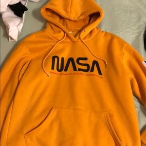 yellow nasa sweatshirt